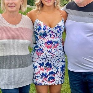 This is a Jovani size 2 sequin dress. Colors are mainly pink/blue iridescent